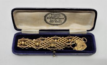 A 9ct. bi-colour gold gate style bracelet, with 9ct. gold heart padlock clasp, length 18cm. (20.8g),