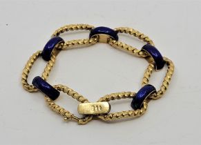 A vintage UnoAErre (Italy) 18ct. yellow gold and blue enamel bracelet, fashioned from alternating