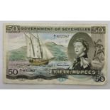 A Government of Seychelles 50 Rupees banknote, 1st January 1969, serial no. A/1 032287, Hugh Selby