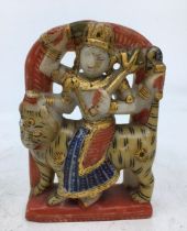 An Indian carved soapstone figure of a deity. H:12cm