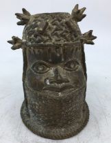 A Benin style bronze figure of a man. H:12cm