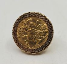 A George V 1915 half sovereign gold coin, London mint, mounted in a 9ct. gold ring, size UK K. (