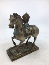 A Sino-Tibetan bronze horse. H:17.7cm