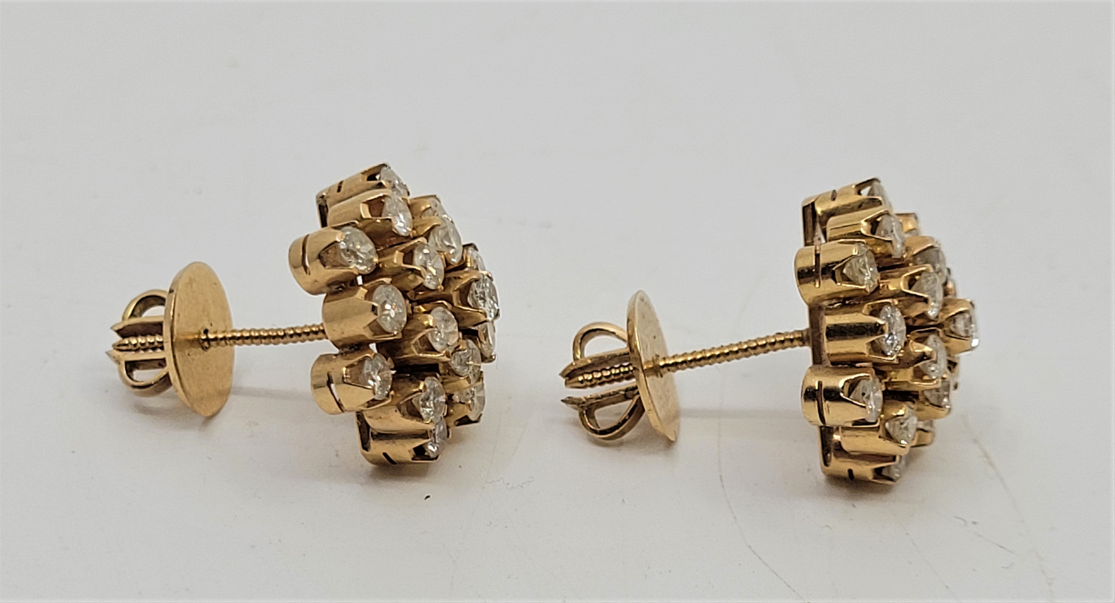 A pair of precious yellow metal diamond cluster earrings, each having domed mount set nineteen round - Image 2 of 3