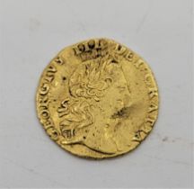 A George III 1762 quarter guinea gold coin, obv. Laur.head, rev. crowned shield, grade as per