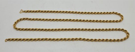 A long Middle Eastern 18ct. gold rope chain necklace, length 100cm. (52.1g)