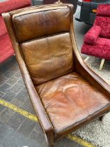 A mid century leather armchair