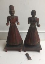 Painted Indian wooden figure of a man and a woman H:52cm (the one a/f)