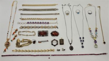 A collection of costume jewellery, to include: a silver and ruby necklace, length 45.5cm (one