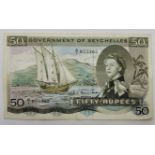 A Government of Seychelles 50 Rupees banknote, 1st January 1969, serial no. A/1 055305, Hugh Selby