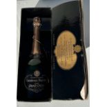 A vintage bottlle of Laurent Perrier Cuvee Grand Secle champagne in original box