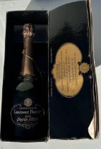 A vintage bottlle of Laurent Perrier Cuvee Grand Secle champagne in original box