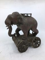 An Indian bronze figure of an elephant on wheels H:22cm