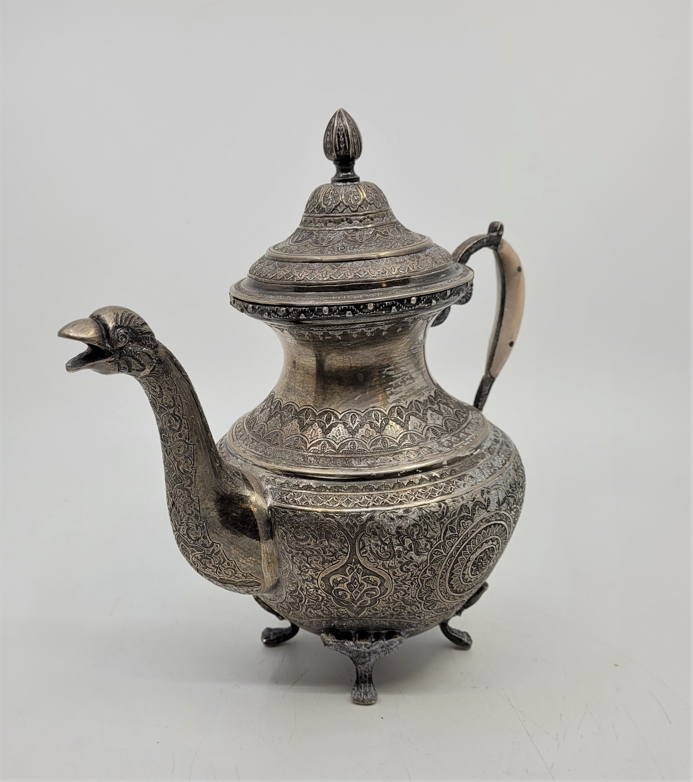 A Persian four piece silver tea service, late 19th/early 20th century, comprising tea pot, coffee - Image 5 of 9