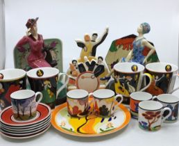 A large collection of porcelain items to include a Claris Cliff and a Susie Cooper porcelain figures