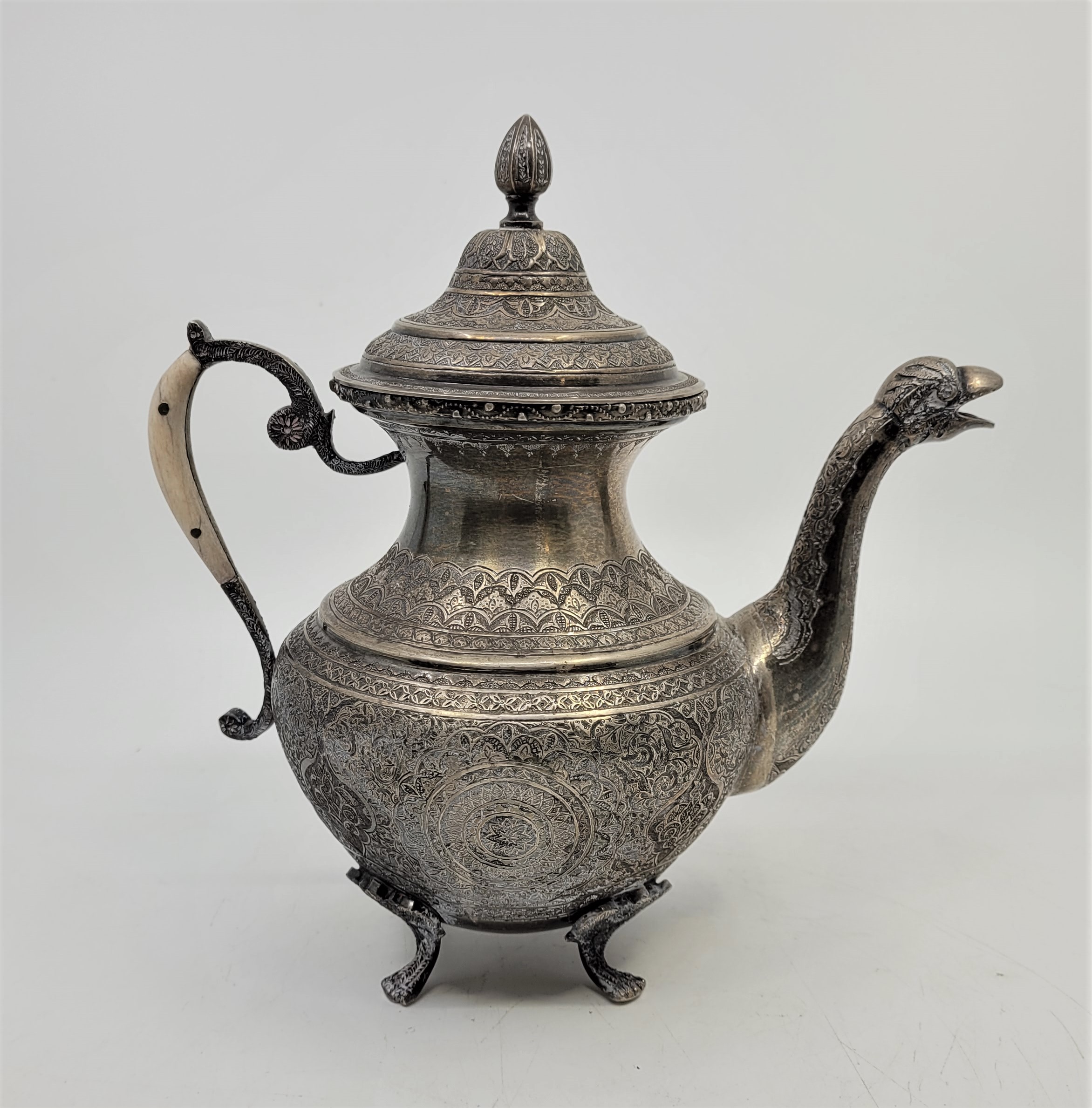 A Persian four piece silver tea service, late 19th/early 20th century, comprising tea pot, coffee - Image 4 of 9