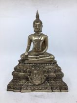 An Asian bronze figure of Buddha. H:27cm