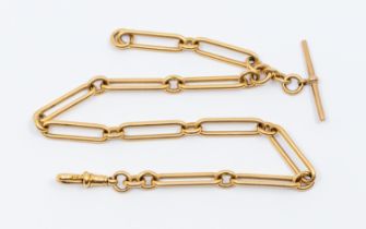 A Victorian 18ct gold trombone link Albert chain, width approx 7mm, each link marked, T bar and