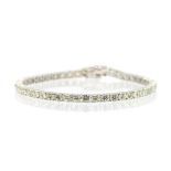 A diamond and 18ct white gold tennis bracelet, comprising a row of forty-six uniform round brilliant