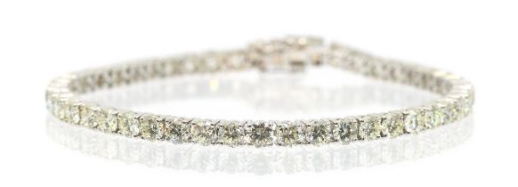 A diamond and 18ct white gold tennis bracelet, comprising a row of forty-six uniform round brilliant