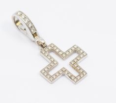 Theo Fennell: a diamond and 18ct white gold cross, comprising an open form cross pave set with small