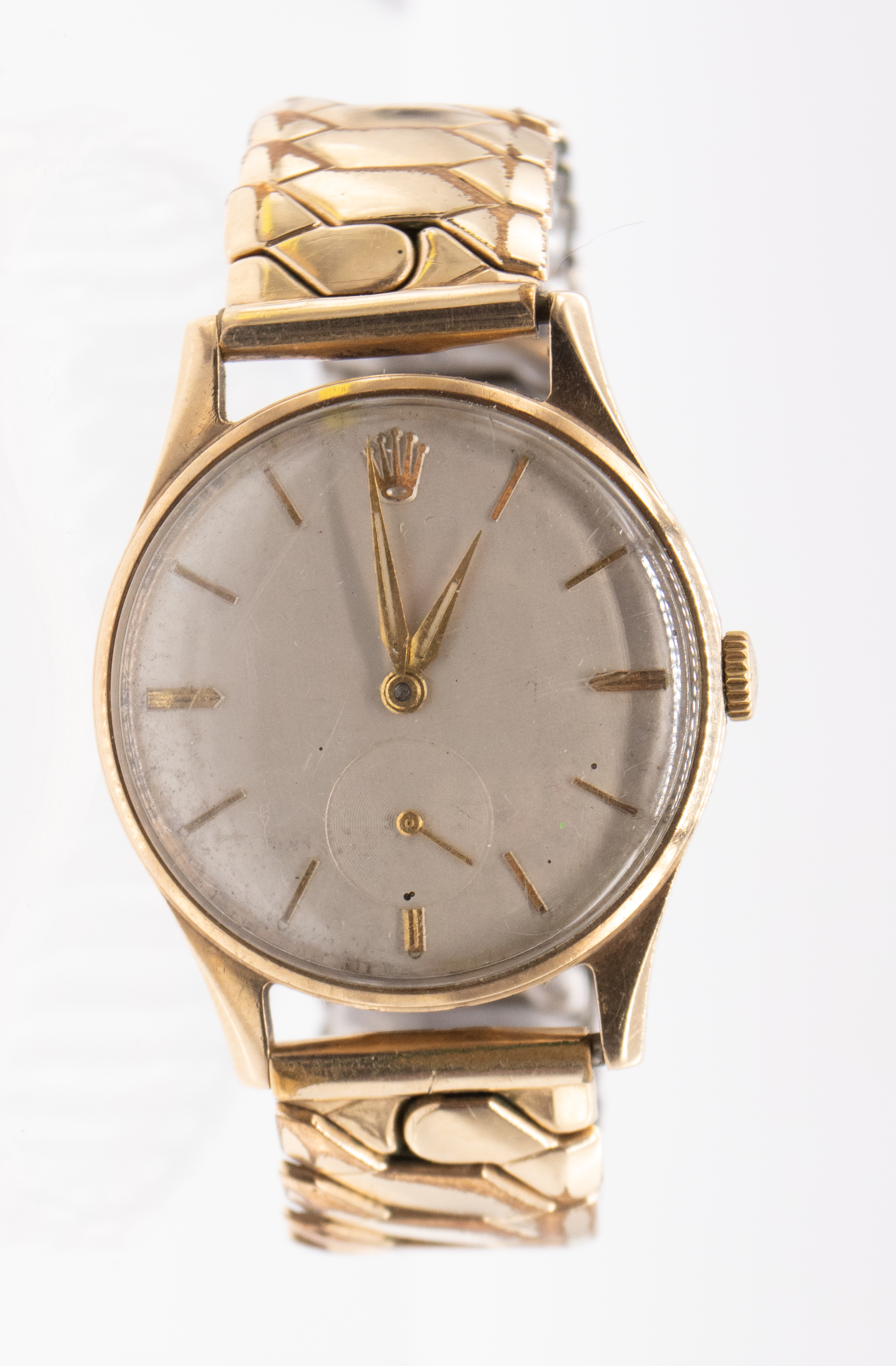 Rolex: a Gentleman's vintage 9ct gold Montres Rolex wristwatch, comprising a silvered dial with