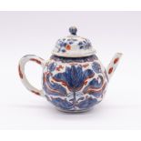 A Chinese Imari ribbed teapot, Kangxi period (1662-1722), the body painted with large central flower