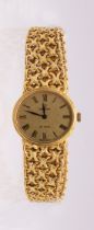 Omega: a Ladies 18ct gold Omega  manual wind wristwatch, comprising an oval signed gold tone dial,