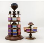 Sewing Interest: a 19th Century mahogany three tier reel stand with raised circular base, the turned