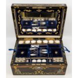A mid Victorian inlaid coromandel rectangular sewing box, the cover and body with cut brass,