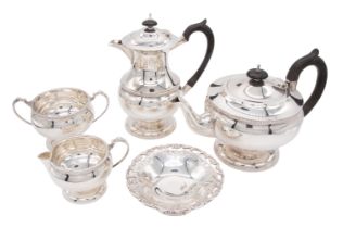 A George VI silver tea and coffee set comprising: tea pot, coffee pot, sugar bowl and milk jug,