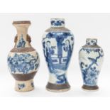Three various Chinese blue and white earthenware vases, all with crackle glaze decorated with