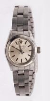 Rolex: a Ladies steel cased Oyster Perpetual wristwatch, comprising a round signed silvered dial