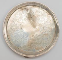 A Victorian Aesthetic silver circular tray, raised border, the centre engraved with birds, flowers