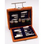 A late Victorian ochre velvet and white metal mounted travelling sewing box, satchel shaped