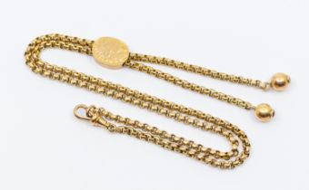 A Victorian 9ct gold lariat necklace, comprising a faceted belcher link chain with an adjustable