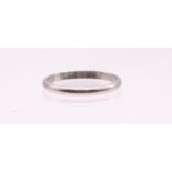 Cartier: a narrow 'D' section platinum band, inscribed to interior 'Cartier pt950 57 QD7771, width