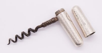 A Victorian silver mounted metamorphic corkscrew, the engine turned handle with central vacant