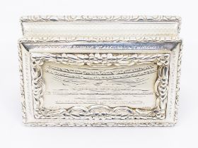 A William IV silver snuff box with elaborate relief foliage designed edging, turned engrved design