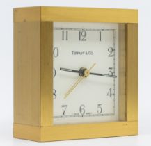 Tiffany & Co heavy brass quartz alarm clock, square form with Arabic hour indices, lume inserts to