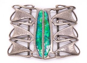 Liberty & Co: a Cymric silver and enamel belt buckle by Archibald Knox, comprising sinuous