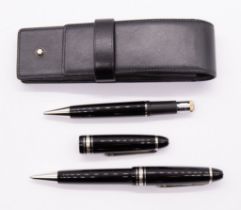 Montblanc: a pair of Meisterstuck ballpoint pens, black with silvered details, the lids with