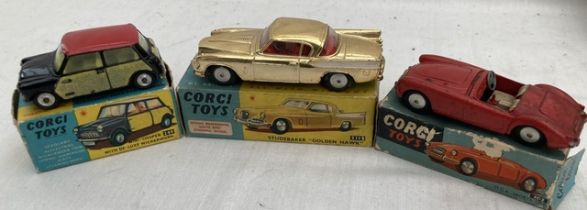 Corgi: A collection of three boxed Corgi Toys vehicles to include: Studebaker Golden Hawk, 211S,