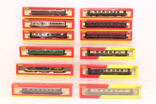 Hornby: A collection of twelve boxed Hornby, OO Gauge coaches and rolling stock to comprise: