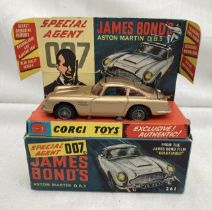 Corgi: A boxed Corgi Toys, James Bond 007 Aston Martin, Reference 261. Original 1965 model in