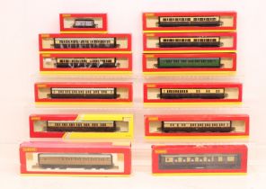 Hornby: A collection of twelve boxed Hornby, OO Gauge coaches and rolling stock to comprise: