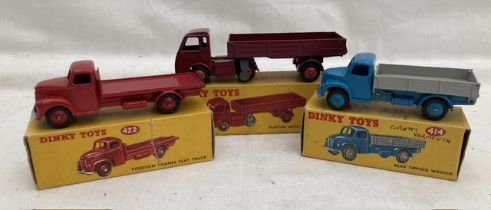 Dinky: A collection of three boxed Dinky Toys trucks to comprise: Rear Tipping Wagon 414 excellent