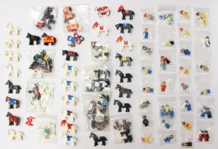 Lego: A collection of approximately 80 Lego Minifigures, including horses and various other