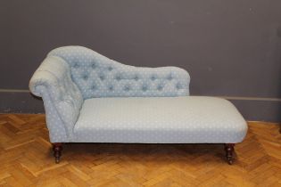 A Victorian chaise longue, with pale blue button upholstery, on turned supports, 160cm