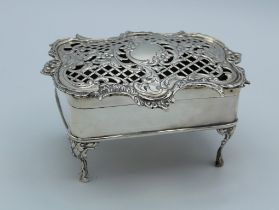 Goldsmiths and Silversmiths company limited, an Edwardian silver pot pourri of casket form, with